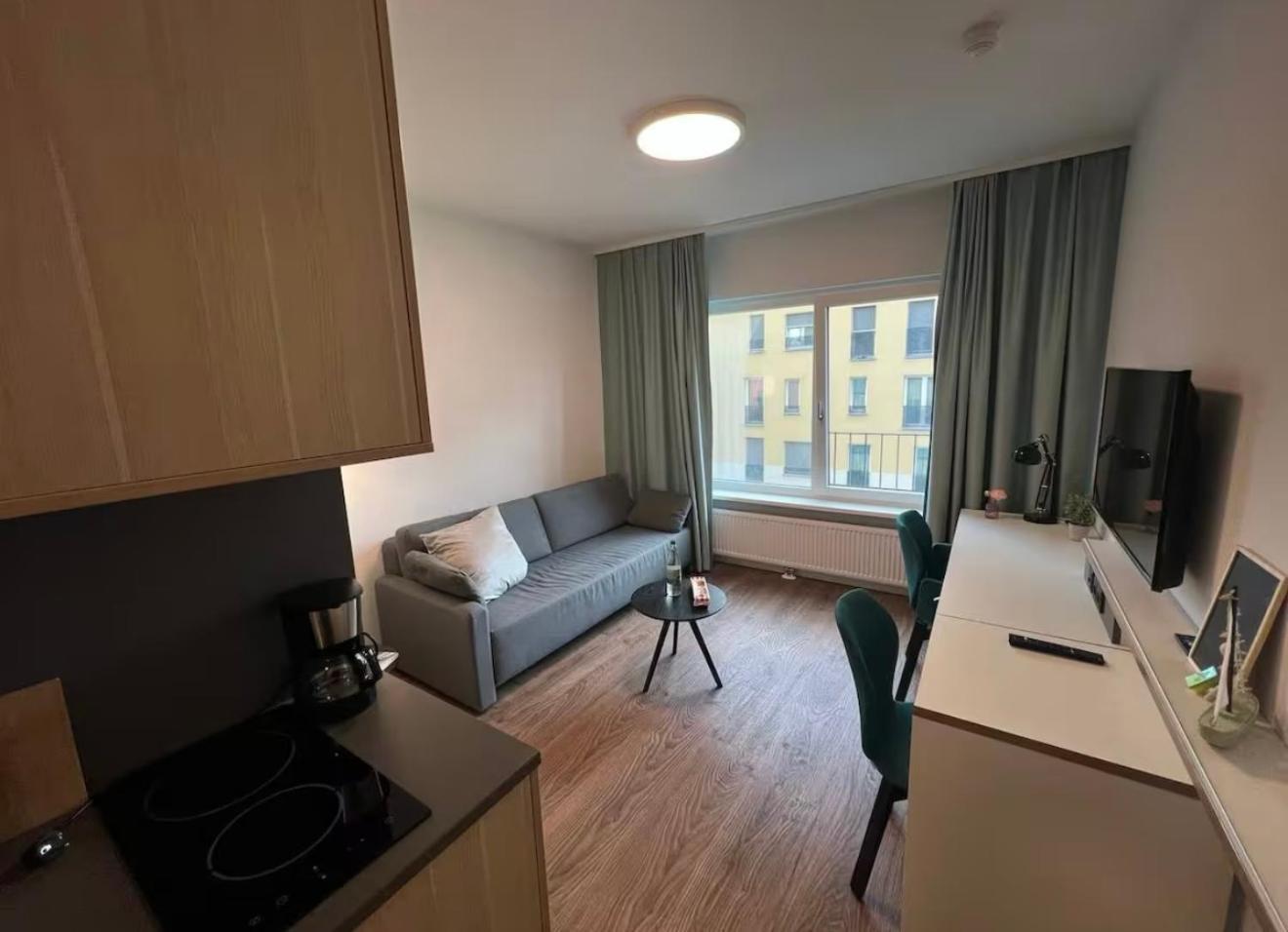 Appartement Modern In & Free Gym Access